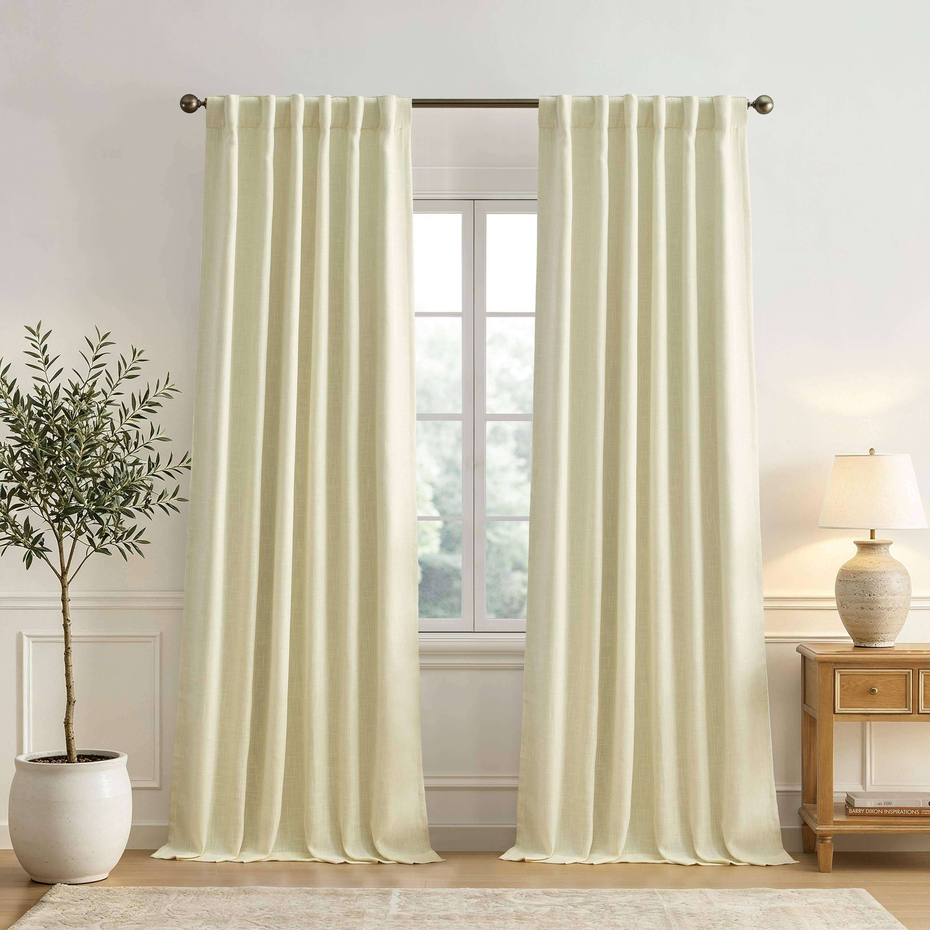 Lenox Serene Ivory Curtains from Threadmade Home hanging at a window in the original supplier photograph