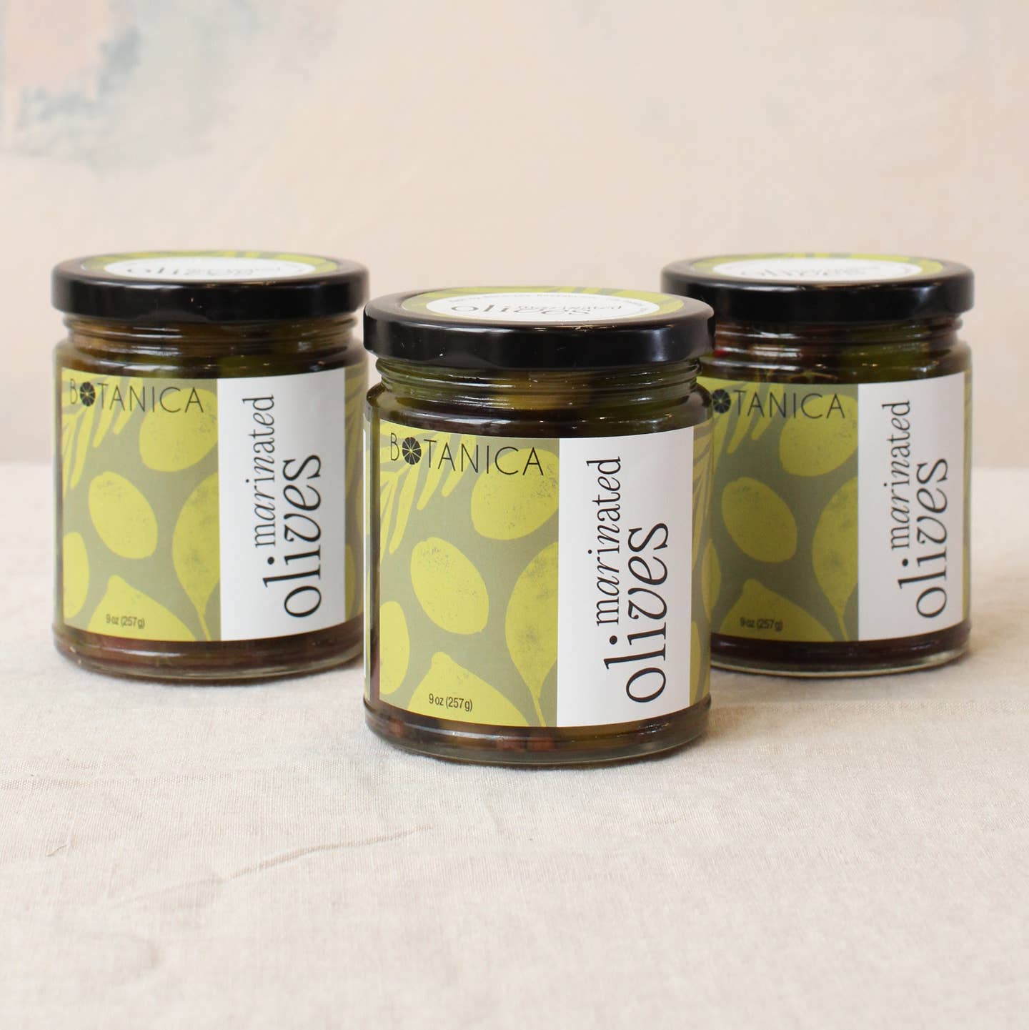 Jar of citrus and herb marinated olives