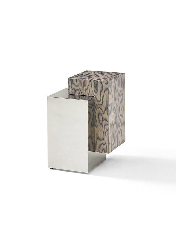 Scala Side Table with a woodgrain block and folded mirrored-metal base on a neutral background